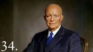 Formal painted portrait of President Dwight D. Eisenhower, a bald older man in a dark suit and blue tie, seated in a chair, with the number 34 in the lower left corner.