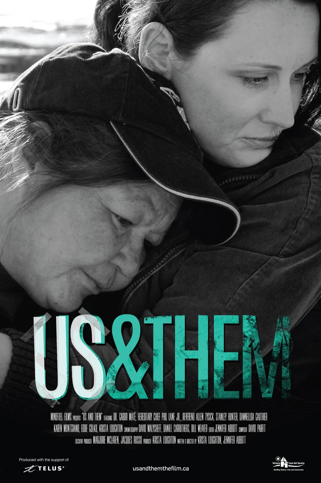 Poster for the film US & Them: a black-and-white photo of an older woman resting her head on a younger woman's shoulder in an embrace, with credits including Dr. Gabor Maté and Hereditary Chief Phil Lane Jr.