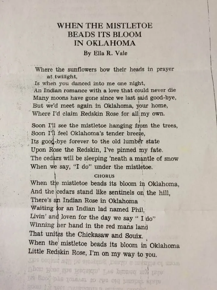 Typed song lyrics titled "When the Mistletoe Beads Its Bloom in Oklahoma" by Ella R. Vale, a love song about Redskin Rose and an Indian lad named Phil, uniting the Chickasaw and Sioux.