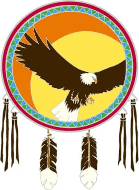 Circular emblem of a bald eagle with outstretched wings against an orange and yellow sun, framed by a red and turquoise patterned border, with hanging feathers and leather fringes.