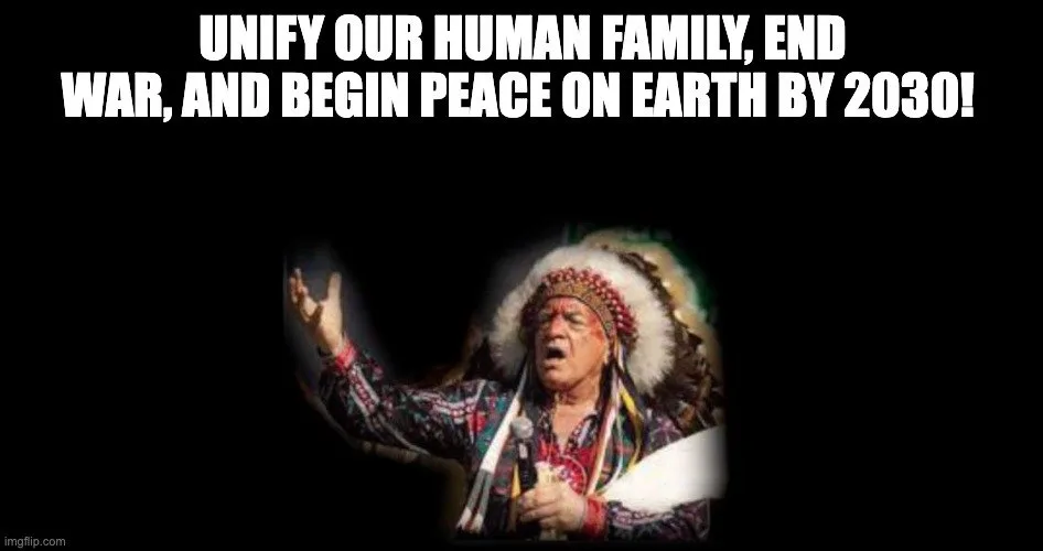 An elder in a feathered headdress and ribbon shirt speaks into a microphone with one arm raised, under the text "Unify our human family, end war, and begin peace on Earth by 2030!"