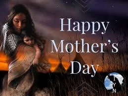 Painting of an Indigenous woman holding a baby wrapped in a blanket against a sunset sky with tipis, beside the words "Happy Mother's Day."
