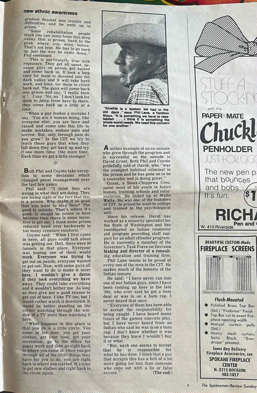 Final article page with a profile portrait of an older man in a cowboy hat, captioned with Phil Lane's words on kinship, beside newspaper ads for pens and fireplace screens.